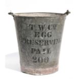 A TW & Co. galvanised egg preserving pail, 34cms (13.25ins) diameter.