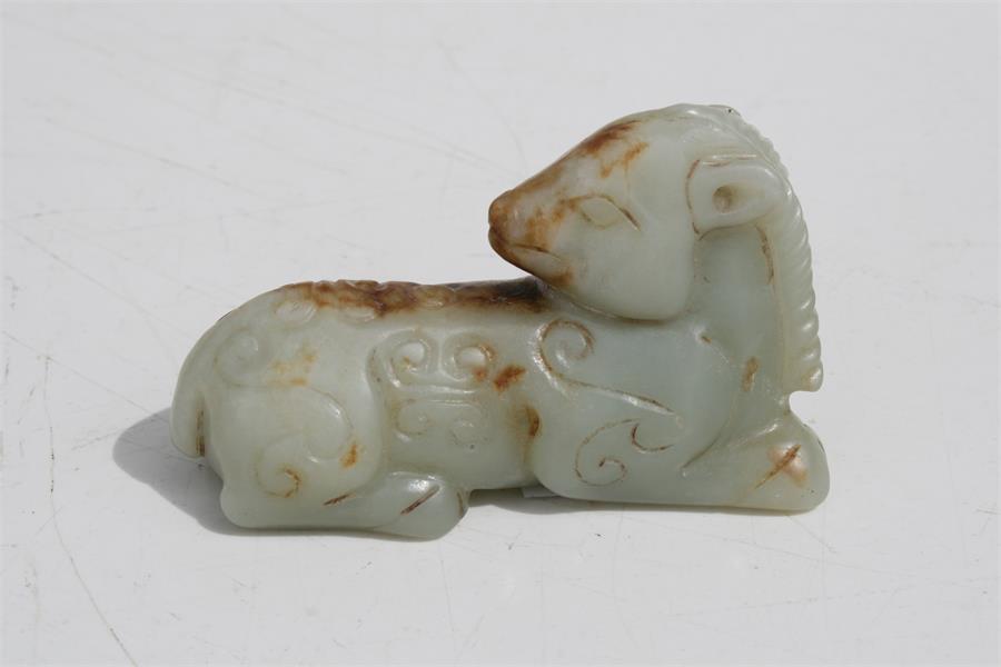 A Chinese mutton jade figure in the form of a recumbent horse, 7.5cms (3ins) long. Condition - Image 3 of 8