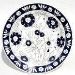 A Booth's silicon china charger with Iznik foliate decoration, 37cms (14.5ins) diameter.