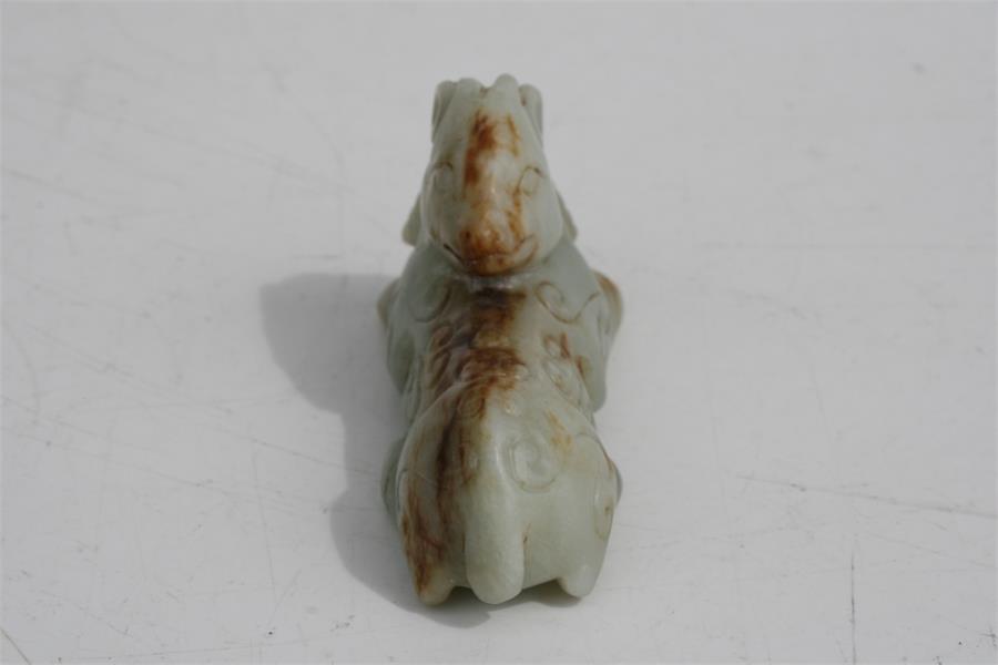 A Chinese mutton jade figure in the form of a recumbent horse, 7.5cms (3ins) long. Condition - Image 6 of 8