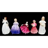 A group of Royal Doulton figures, to include Bridesmaid HN2874, Kirstie HN 3213; and Joy HN3875 (