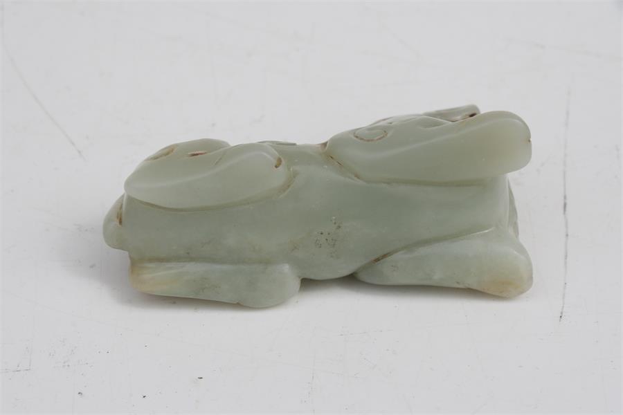 A Chinese mutton jade figure in the form of a recumbent horse, 7.5cms (3ins) long. Condition - Image 8 of 8