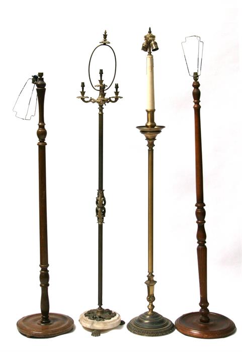 Two brass standard lamps and two wooden standard lamps (4).