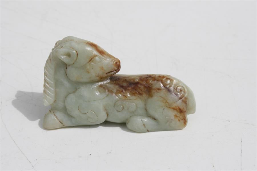 A Chinese mutton jade figure in the form of a recumbent horse, 7.5cms (3ins) long. Condition - Image 5 of 8