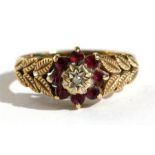 A 9ct gold ruby & diamond cluster ring, approx UK size 'O'.