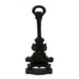 A Victorian cast iron doorstop, 40cms (15.75ins) high.