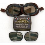 A pair of WW2 RAF pilots goggles, impressed AM to the leather with a paper label to strap marked