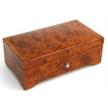 A Thoren's of Switzerland yew wood music box playing six aires, 21cms (8.25ins) wide.