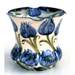 A Moorcroft for MacIntyre Florian ware jardiniere decorated with typical blue poppy head design,