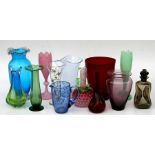 A quantity of Victorian and later Art glass vases and jugs.