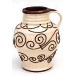 A C H Brannan pottery jug with tube line decoration, 23cms (9ins) high.