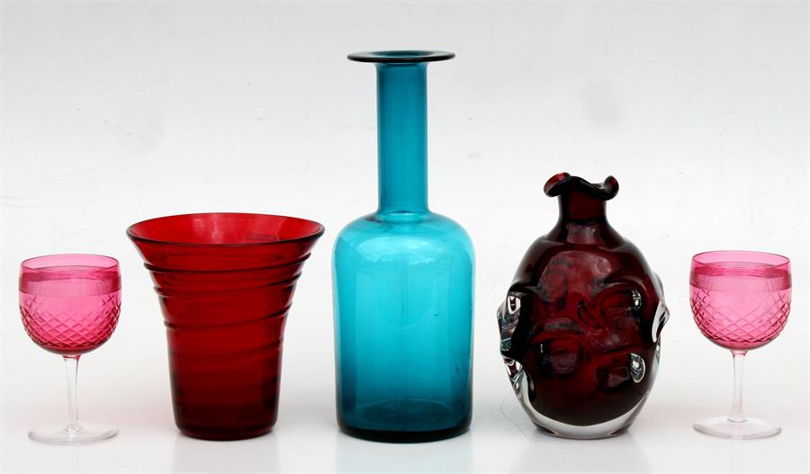 An Otto Breuer blue glass vase, 25.5cms (10ins) high; together with other glassware.