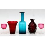 An Otto Breuer blue glass vase, 25.5cms (10ins) high; together with other glassware.