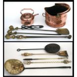 A copper coal scuttle; a copper kettle; a set of brass handled fire irons and other items.