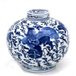 A Chinese blue & white vase & cover of globular from, decorated with lions amongst clouds, 24cms (