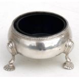 A Victorian silver salt with blue glass liner, London 1864.