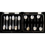 A cased set of silver coffee bean spoons, Birmingham 1919; together with a cased set of silver