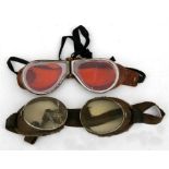 Two pairs of WW1 RFC / RAF flying goggles. Both with cracked lenses