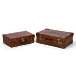 Two early 20th century John Pound & Co. London, leather suitcases, 62cms (24.5ins) and 52cms (20.