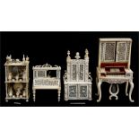 A group of 19th century continental carved bone miniature or dolls house furniture including a