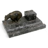 A marble desk stand with single inkwell and bronzed bear, 24cms (9.5ins) wide.