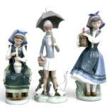 Three Lladro figures, Girl with Ducks, Girl with Flowers and Girl with Vase, the largest 27cms (10.