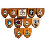 Ten assorted wall shields or plaques including RAF School of Technical Training, Princess Marys