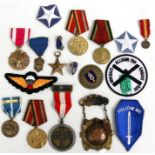 A small collection of mainly American and Russian badges and medals