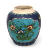 A Japanese pottery cloisonne vase decorated with flowers on a blue ground, red three character