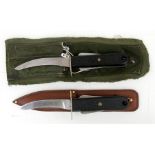 Two Royal Air Force aircrew survival knives in scabbards. One blade is marked 22c/1278/06. Blade