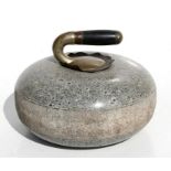 A granite curling stone.