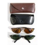 Two pairs of vintage Ray-Ban sunglasses, serial numbers 'RB3143' & 'RB3131', both cased.
