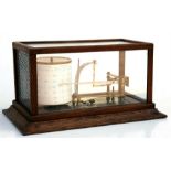 A late 19th / early 20th century Stanley of London oak cased thermograph, 35.5cms (14ins) wide.