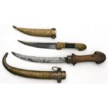 Two Syrian daggers and scabbards, 29cms (11.5ins) and 40cms (15.75ins) (2).