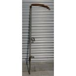 A vintage garden scythe.