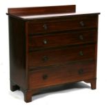 An Edwardian mahogany chest with four graduated long drawers. 92cm (36ins) wide
