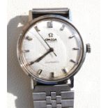 A gentleman's Omega Automatic Seamaster wristwatch, the brushed silver dial with baton markers.