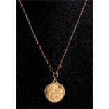 A 9ct gold St Christopher pendant on a 9ct gold chain.