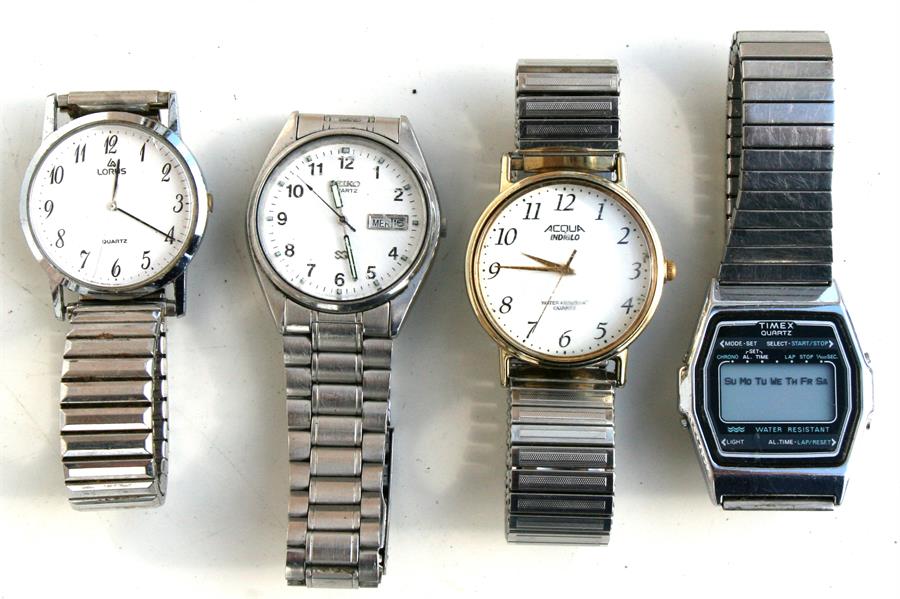 Four gentleman's wristwatches including a Timex Digital.