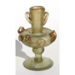 A hand blown Romanesque two-handled glass vase, 15cms (6ins) high.