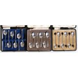 A cased set of Art Deco silver teaspoons, London 1920; together with two other cased sets of tea and