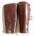 Two pairs of Army officers leather gaiters. Overall lengths 44cms (17.25ins) and 28cms (11ins)