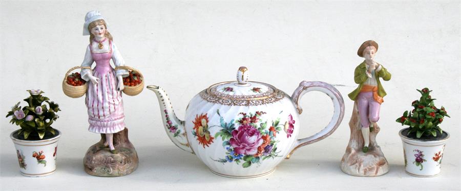 A Dresden teapot of globular form decorated with flowers; together with a pair of continental