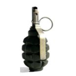 A complete inert hand grenade, marked UZRGM to the lever, 13cms (5.125ins) high.