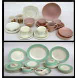 A Burleigh Ware part dinner service; together with a pink Poole Pottery part tea service; and