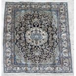 A handmade Persian Esfahan rug with central foliate design on a cream ground, 207 by 148cms (81.5 by