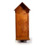 A Gothic oak wall mounted icon display stand, probably from a church, 59cms (23ins) wide.