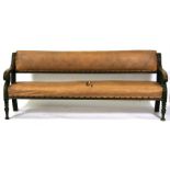 A late 19th century country house mahogany framed hall bench with upholstered seat and back, on