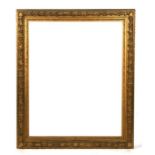 A large 19th century gilt gesso picture frame with acorn and oak leaf motifs, inner dimensions 103