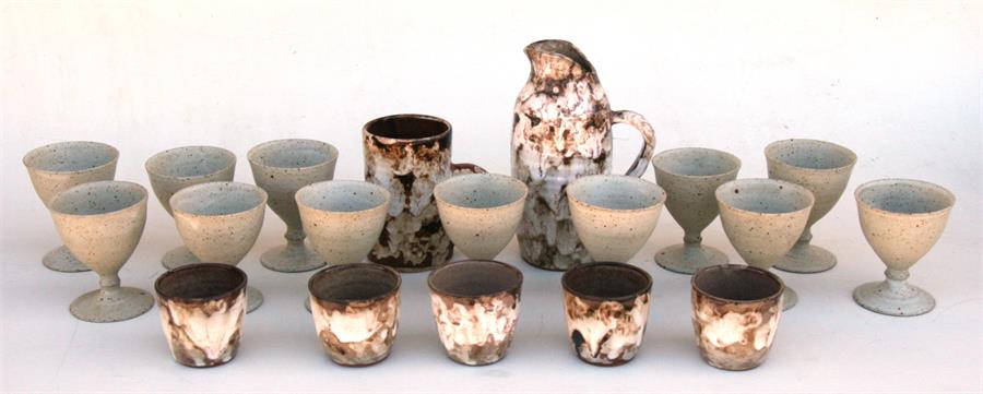 A set of twelve Keith Ashley Studio Pottery goblets, 11cms (4.25ins) high; together with a group